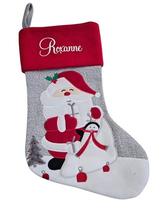 Personalised Christmas stocking - Santa and penguin. Cursive font