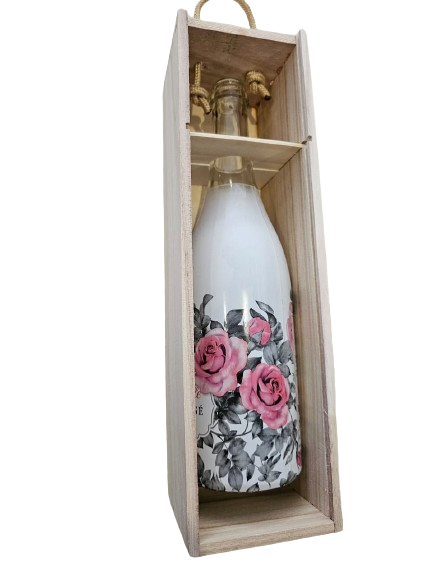 Wine box containing a bottle of sparkling wine