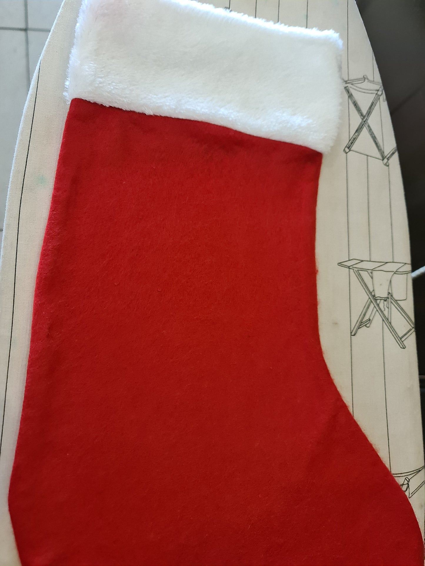 Do it yourself DIY heat vinyl decals for Christmas hats, stockings, or any fabric.
