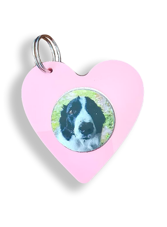 Pink heart-shaped Memory Touch keyring on a keyring loop, shown with a discreet embedded message tag