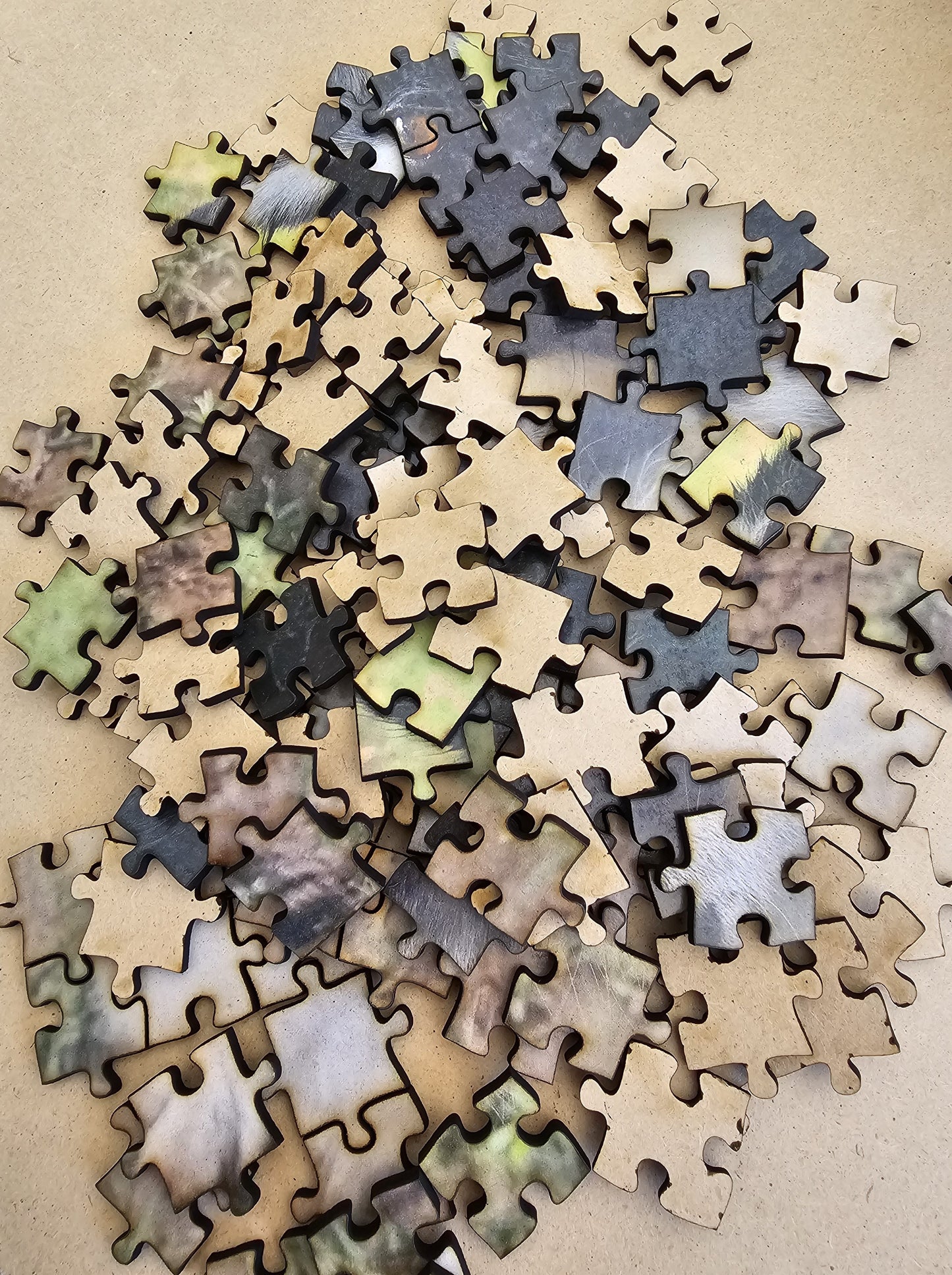 Personalised photo-puzzle pieces